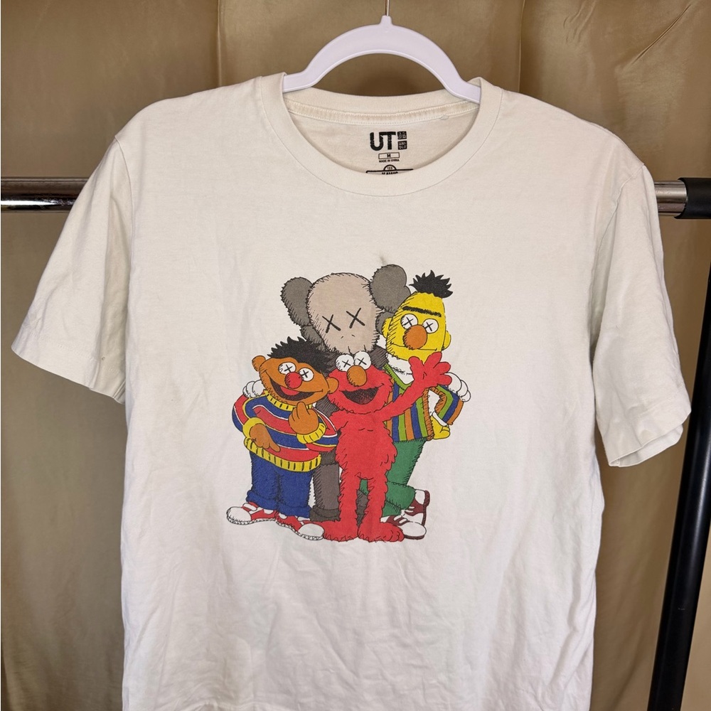 KAWS UT Cream Graphic Tee